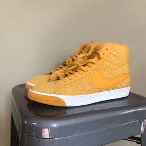 SOLD // NIKE yellow quilted high tops